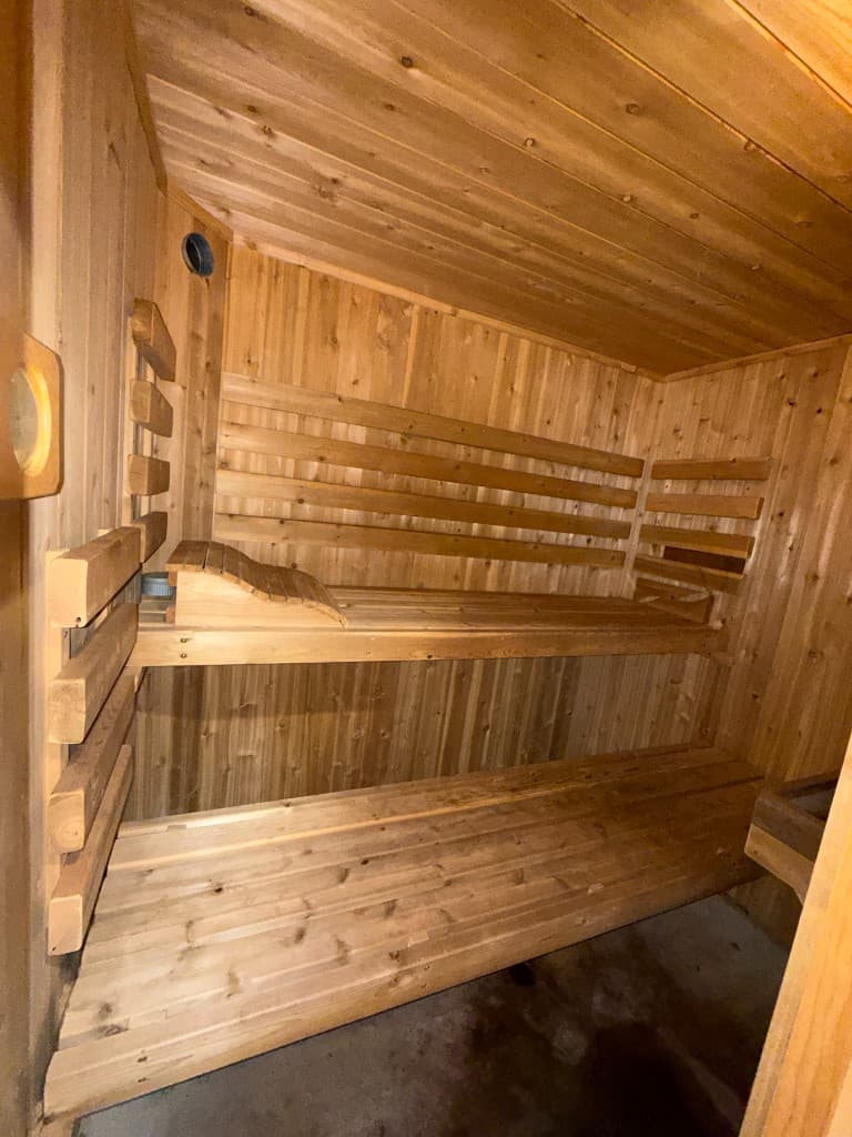 Custom sauna — interior benches and wood paneling