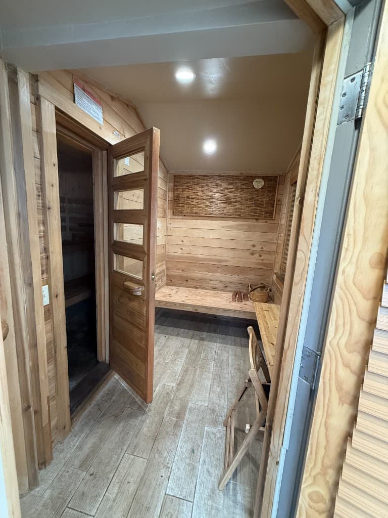Custom sauna — changing room with bench and accessories